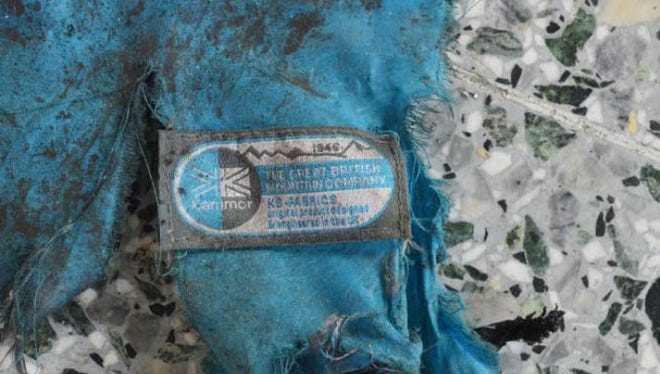 This photo obtained May 24, 2017 from The New York Times who got it from British Law Enforcement, shows what the bomber in the Manchester terrorist attack appeared to have carried as a powerful explosive in a lightweight metal container concealed within a blue Karrimor backpack, and to have held a small detonator in his left hand, according to preliminary information gathered by British authorities in Manchester, England.