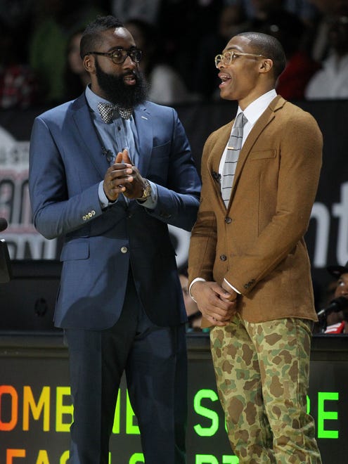 2013: James Harden talks with Russell Westbrook as they serve as coaches the All-Star celebrity game.