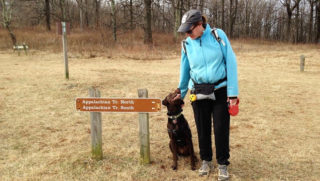 Day-hiker Kim Beatty of Alexandria, Virginia, and her hiking buddy Ellie are ready to set out on the A.T. at Sky Meadows State Park in Maryland.