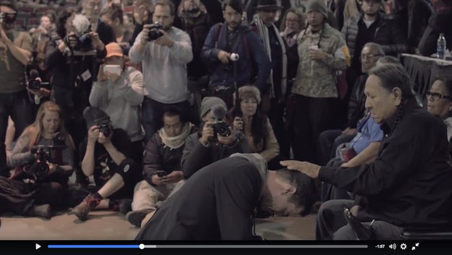 Chief Leonard Crow Dog, a Lakota spiritual leader, lays his hand upon Wes Clark Jr. in a still from a Facebook video posted by Our Revolution.