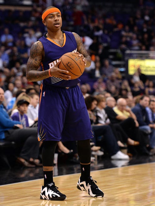Oct 16, 2014: Phoenix Suns guard Isaiah Thomas (3) looks to pass the ball against the San Antonio Spurs in the first half at US Airways Center.