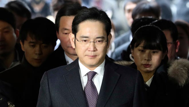 In this Jan. 18, 2017, file photo, Lee Jae-yong, front, a vice chairman of Samsung Electronics Co. arrives for the hearing at the Seoul Central District Court in Seoul, South Korea.