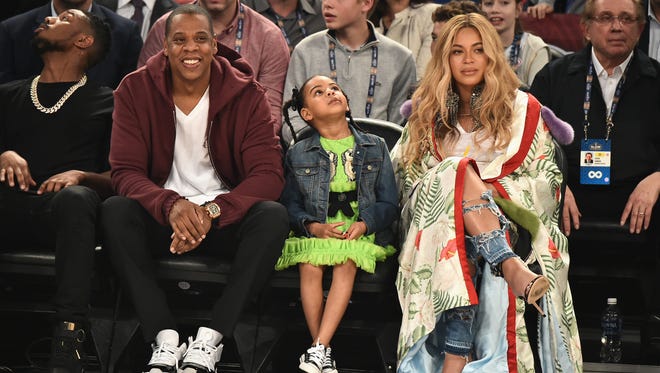 NEW ORLEANS, LA - FEBRUARY 19:  Jay Z, Blue Ivy Carter, Beyoncé Knowles attend the 66th NBA All-Star Game at Smoothie King Center on February 19, 2017 in New Orleans, Louisiana.  (Photo by Theo Wargo/Getty Images) ORG XMIT: 696411025 ORIG FILE ID: 643015450