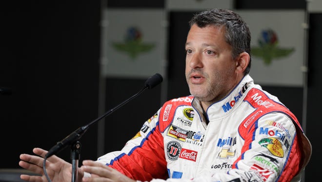 Tony Stewart addresses reporters ahead of his final Brickyard 400 at Indianapolis Motor Speedway on July 22.