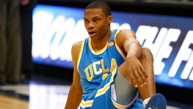 2008: UCLA guard Russell Westbrook stretches before the start of a game against Memphis.
