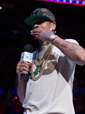 Allen Iverson acknowledges the fans as he is honored during a ceremony for his induction to the Hall of Fame.