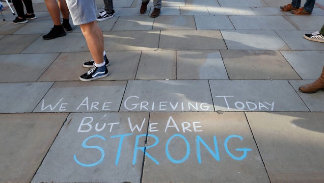 A message is written on the pavement in Manchester, England, on May 23, 2017.