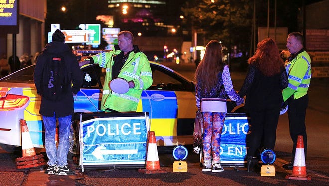 Emergency services work at Manchester Arena after reports of an explosion. Several people have died following reports of an explosion at an Ariana Grande concert in northern England, police said. A representative said the singer was not injured.