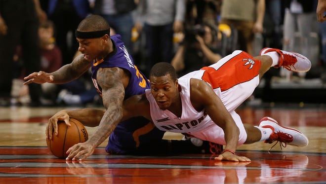 Nov. 24, 2014: Kyle Lowry and Thomas battle for the ball at the Air Canada Centre.