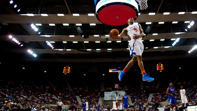 2011: Russell Westbrook goes up for a dunk during a charity game.