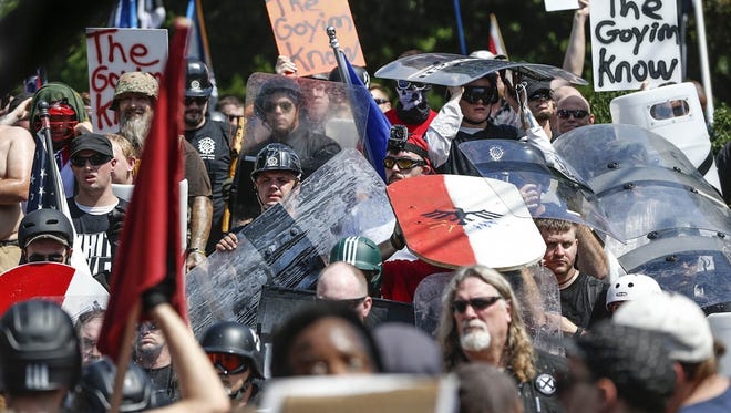 Multiple white nationalist groups hold the grounds Emancipation Park, formerly known as Lee Park, during a 'Unite the Right' rally.