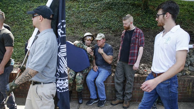 White nationalist David Duke is shown video footage as multiple white nationalist groups march to McIntire Park in Charlottesville on Saturday, August 12, 2017.