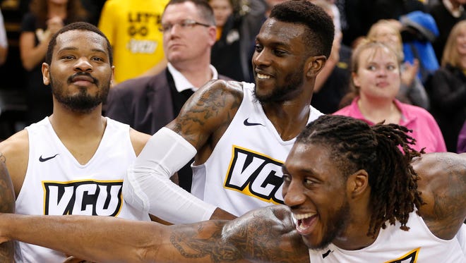 Jordan Burgess (20), JeQuan Lewis (1) and Mo Alie-Cox (12) all figure to play a part in VCU's success this season.