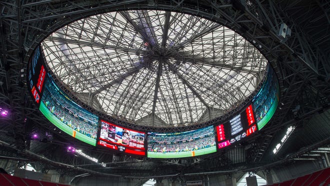 The overhead oculus, which can open to the sky, and ring video board at Mercedes-Benz Stadium.
