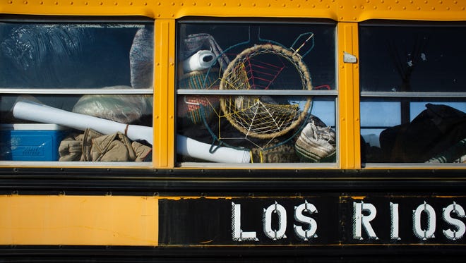 A dream catcher hangs in a bus window in the Oceti Sakowin Camp near the Standing Rock Reservation on Saturday, Dec. 3, 2016 near Cannon Ball.
