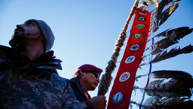 A group of native veterans arrive to an interfaith prayer circle in the Oceti Sakowin Camp near the Standing Rock Reservation on Sunday, Dec. 4, 2016 near Cannon Ball.