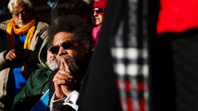 Cornel West listens during an interfaith prayer circle in the Oceti Sakowin Camp near the Standing Rock Reservation on Sunday, Dec. 4, 2016 near Cannon Ball.