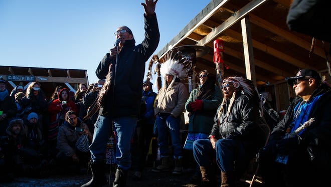 Tribal and Religious leaders speak during an interfaith prayer circle in the Oceti Sakowin Camp near the Standing Rock Reservation on Sunday, Dec. 4, 2016 near Cannon Ball.