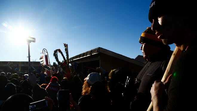 Demonstrators celebrate after the Army Corps of Engineers denied Dakota Access an easement to cross the Missouri River on Sunday, Dec. 4, 2016 near Cannon Ball.