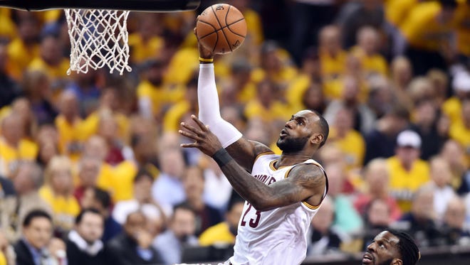 Cleveland Cavaliers forward LeBron James (23) drives to the basket against Toronto Raptors forward DeMarre Carroll (5) during the first quarter in game one of the second round of the 2017 NBA Playoffs at Quicken Loans Arena.