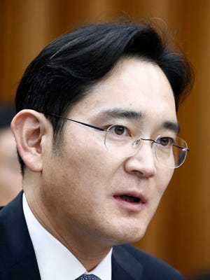 A file picture dated Dec. 6, 2016 shows Lee Jae-yong, vice chairman of Samsung, answering questions during a parliamentary hearing over the Choi Soon-sil corruption probe at the National Assembly in Seoul, South Korea.