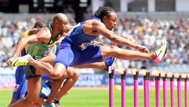 Aries Merritt of the USA led the way in Round 1 of the 110 hurdles.