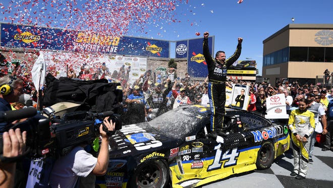 Tony Stewart celebrates after winning the 2016 Toyota/Save Mart 350 at Sonoma Raceway for his first Sprint Cup victory in three years.