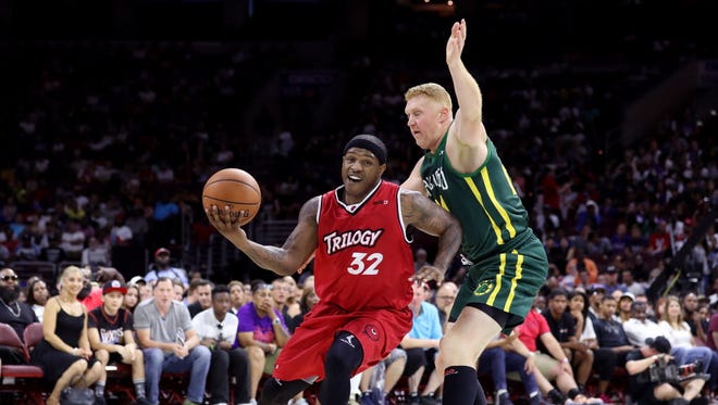 Rashad McCants of Trilogy handles the ball against Brian Scalabrine of the Ball Hogs during Week 4.
