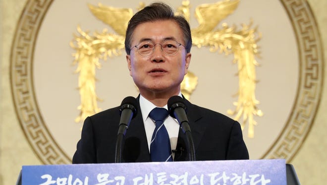 epa06147888 South Korean President Moon Jae-in is pictured speaking during a news conference at Cheong Wa Dae (Blue House) in Seoul, South Korea.
