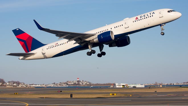 A Delta Boeing 757 takes off from Boston Logan Airport.