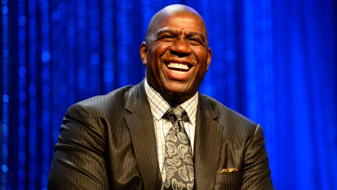 NBA legend Magic Johnson laughs during the 2014 NBA All-Star Game Legends Brunch at Ernest N. Morial Convention Center.