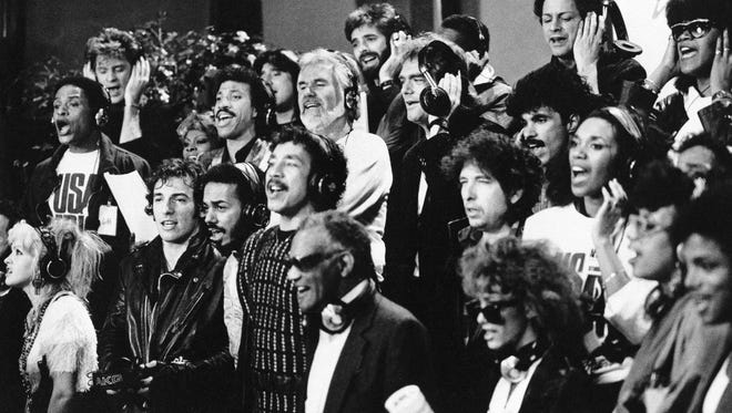Milwaukee native Al Jarreau (middle row, far left) was among the musicians who recorded "We Are The World" in Los Angeles on Jan. 30, 1985.