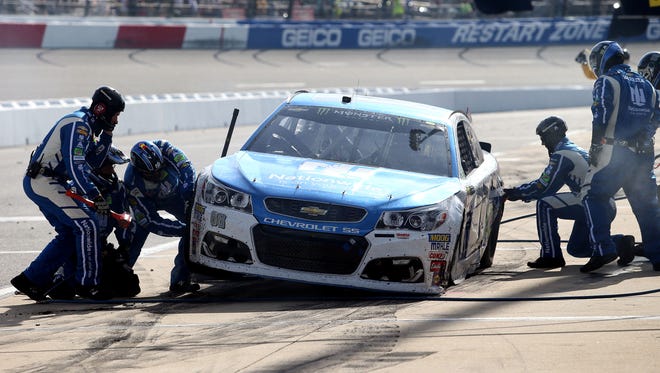 Dale Earnhardt Jr. hits pit road for adjustments during the Toyota Owners 400 at Richmond.