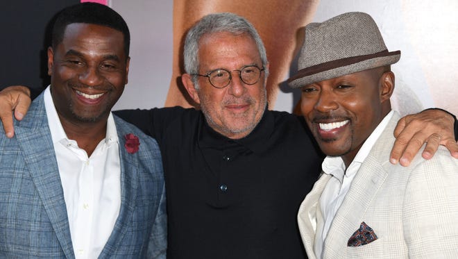 Executive producer James Lope, NBC Universal Vice Chairman Ron Meyer and producer Will Packer posed together for a picture.