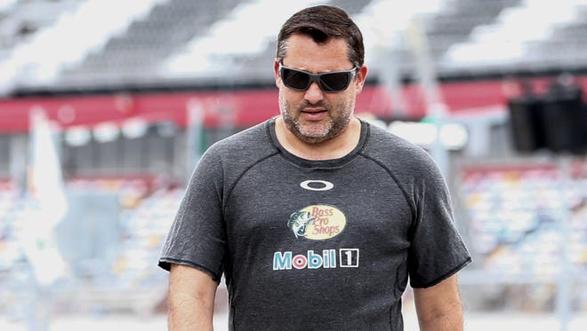 Tony Stewart won Sprint Cup titles in 2002, 2005 and 2011.