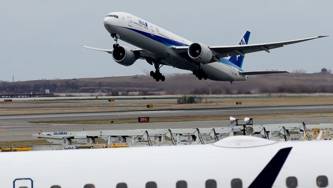 An ANA Boeing 777-300 takes off from New York's JFK Airport.