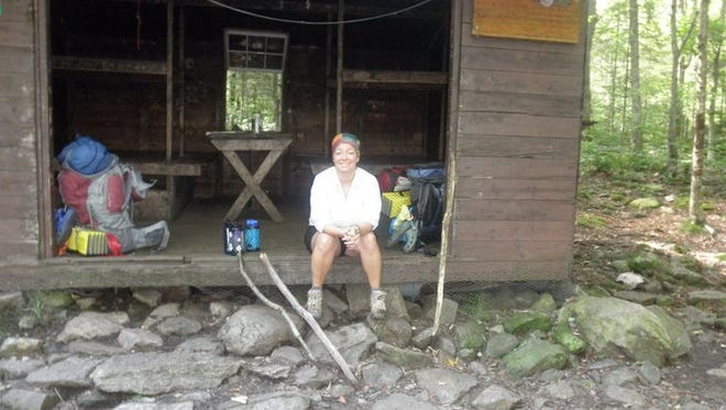 Segment-hiker Maureen Cacioppo stops at a shelter whilst hiking the A.T. from Massachusetts to Vermont.