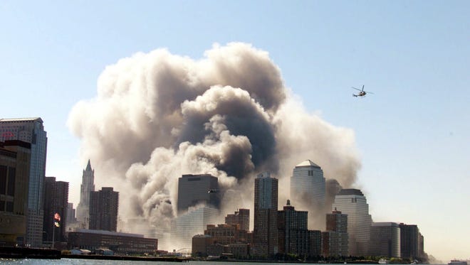 Smoke fills the air around the World Trade Center in New York City on Sept. 11, 2001.