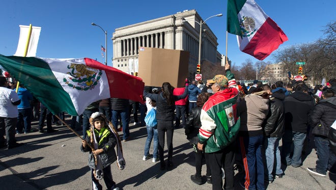 Thousands of people take part in the "Day Without Latinos, Immigrants and Refugees" march and demonstration Feb. 13 in Milwaukee.