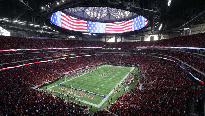 The national anthem is played before the Atlanta Falcons' first game at Mercedes-Benz Stadium.