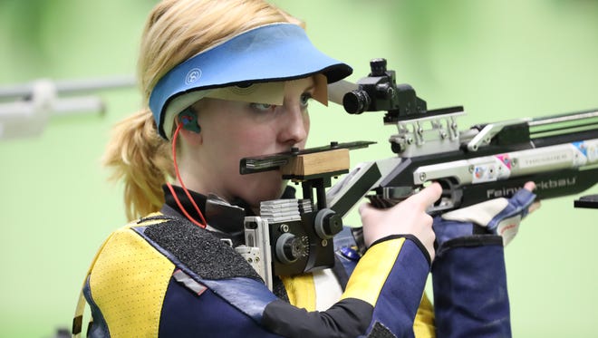 Ginny Thrasher of the United States readies herself to shot during the 10-meter air rifle qualification at Olympic Shooting Centre. Thrasher   won gold in the event.