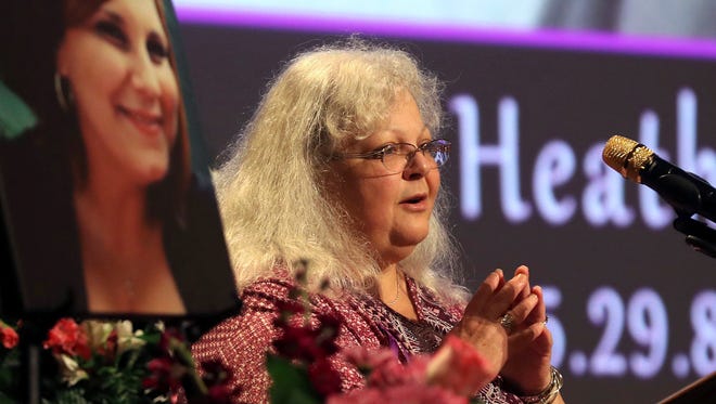 Susan Bro, mother of Heather Heyer, speaks during a memorial for her daughter on Aug. 16, 2017, at the Paramount Theater in Charlottesville, Va.
