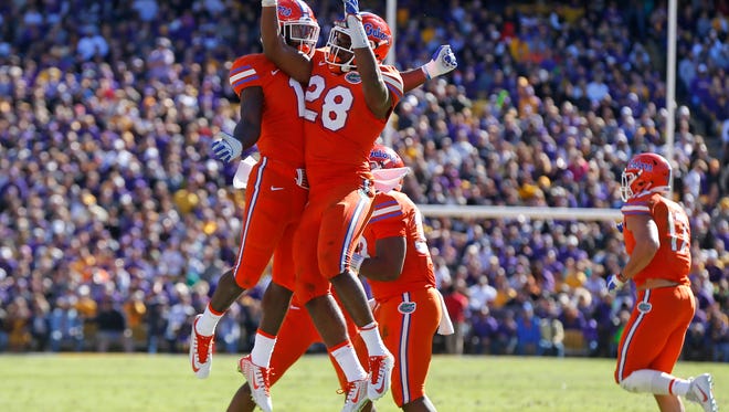 Florida linebacker Kylan Johnson (28) celebrates a fumble recovery in the first half against LSU.