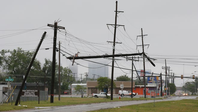 Damaged power lines are pictured in Oklahoma City on April 29, 2017. Severe thunderstorms have toppled tree limbs and power lines and caused minor flooding across Oklahoma.