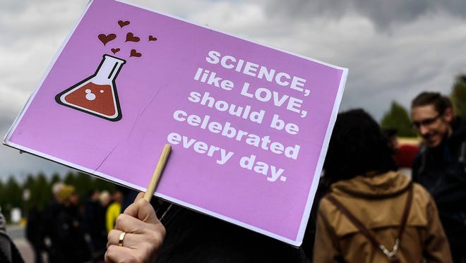 A demonstrator participates in the 'March for Science' in Dresden, Germany.