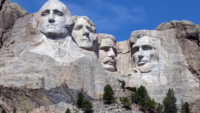 South Dakota - Mount Rushmore is one of the most famous rock formations in the US because it holds the faces of four United States Presidents. Near Keystone, South Dakota George Washington, Thomas Jefferson, Theodore Roosevelt, and Abraham Lincoln will all look down on you from their perch in the mountain. Ah, America!