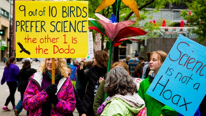 Thousands participate in the March for Science in downtown Cincinnati.