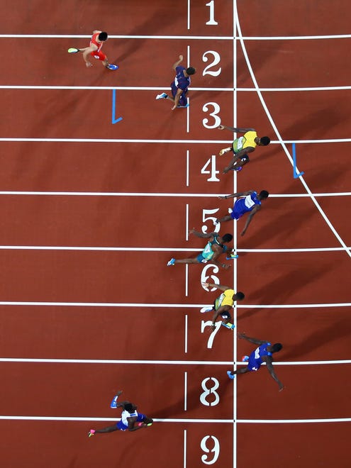 Bottom to top, Reece Prescod of Great Britain, Justin Gatlin of the USA (gold), Yohan Blake of Jamaica, Akani Simbine of South Africa, Christian Coleman of the USA (silver), Usain Bolt of Jamaica (bronze), Jimmy Vicaut of France and Bingtian Su of China at the finish line of the 100.