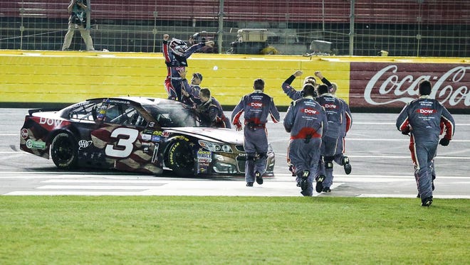 Austin Dillon and crew celebrate their Coca-Cola 600 victory at Charlotte Motor Speedway on May 28.