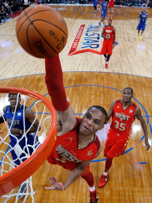 2011: Russell Westbrook goes up for a dunk during the first half of the NBA All-Star Game.